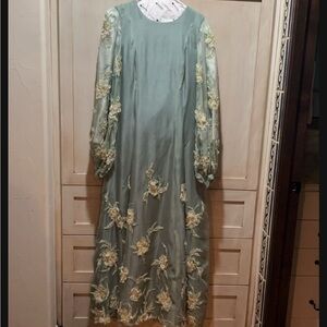 Stunning Nardos Custom Made Dress.
Worn once!